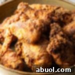 Southern Cast Iron Fried Chicken 13 Crispy homemade southern fried chicken pieces in a bowl.