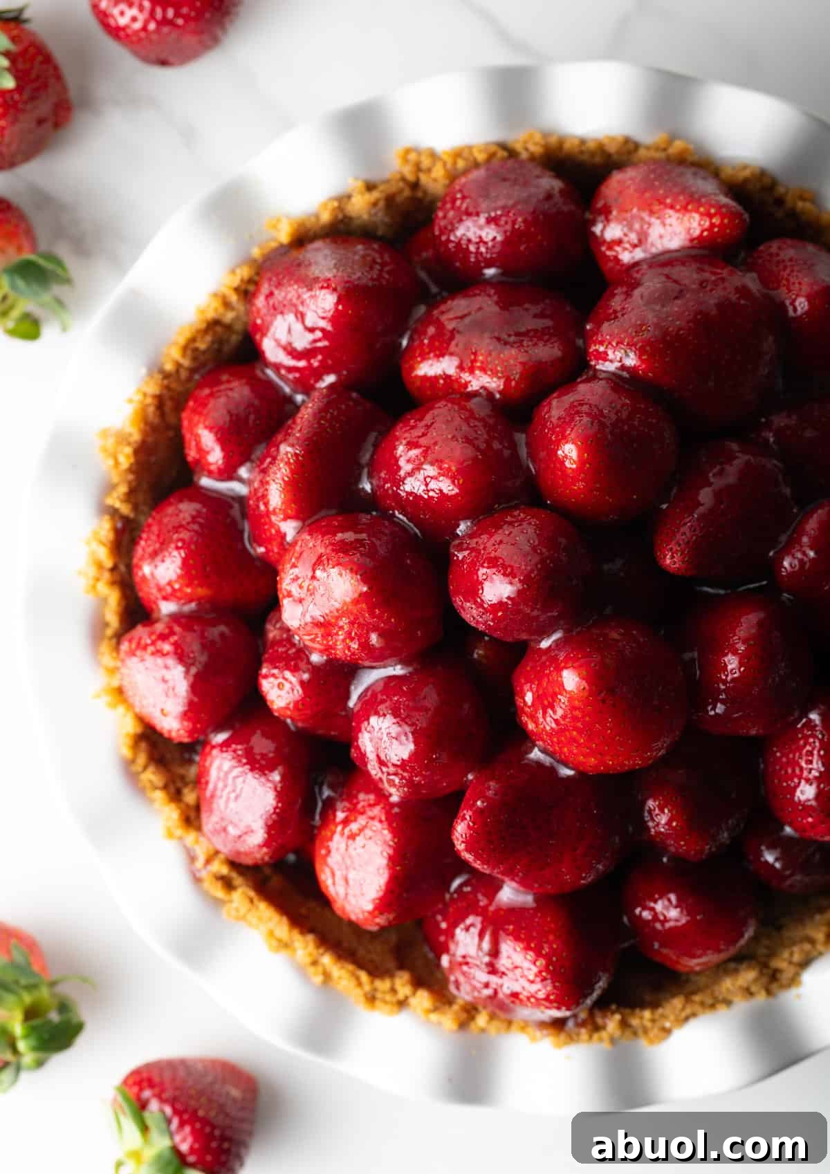 A fresh strawberry pie loaded with glazed strawberries.