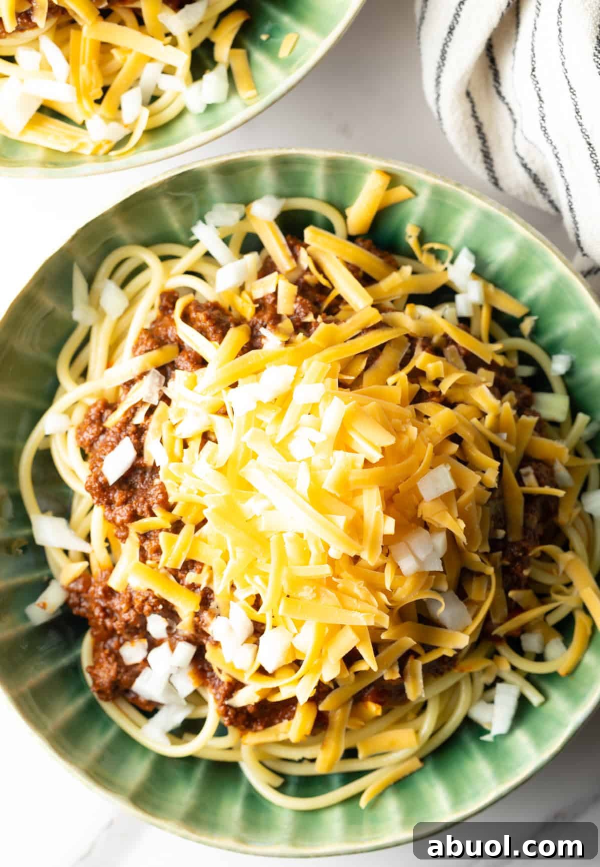 An overhead shot of a bowl of a Cincinnati chili recipe.